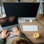 it-specialist-works-on-laptop